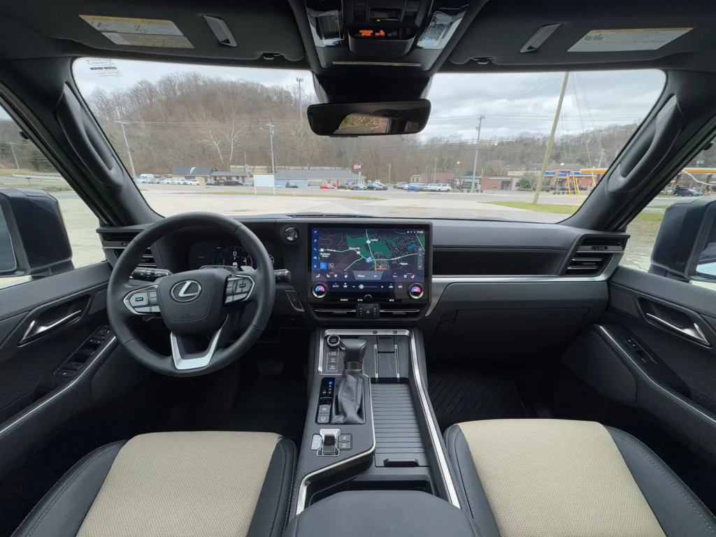 2024 Lexus GX 550 interior with sleek dashboard, large touchscreen display, and modern steering wheel design.