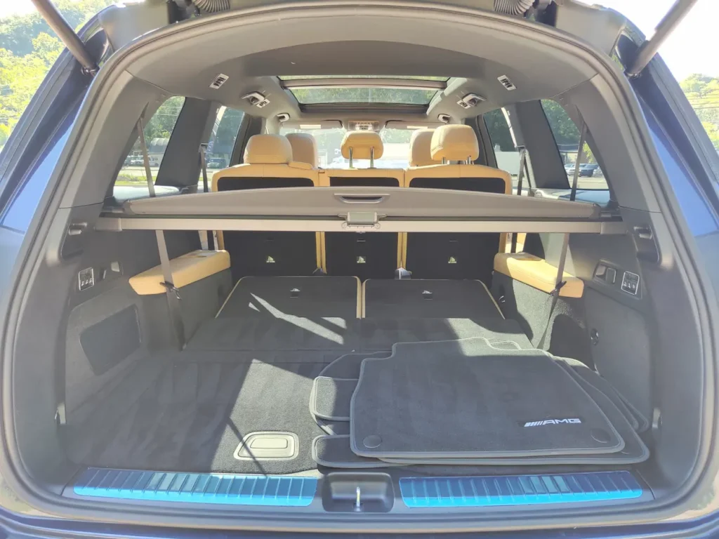 Cargo area of 2024 Mercedes-Benz GLS 580 showing fold-flat rear seats and spacious storage.
