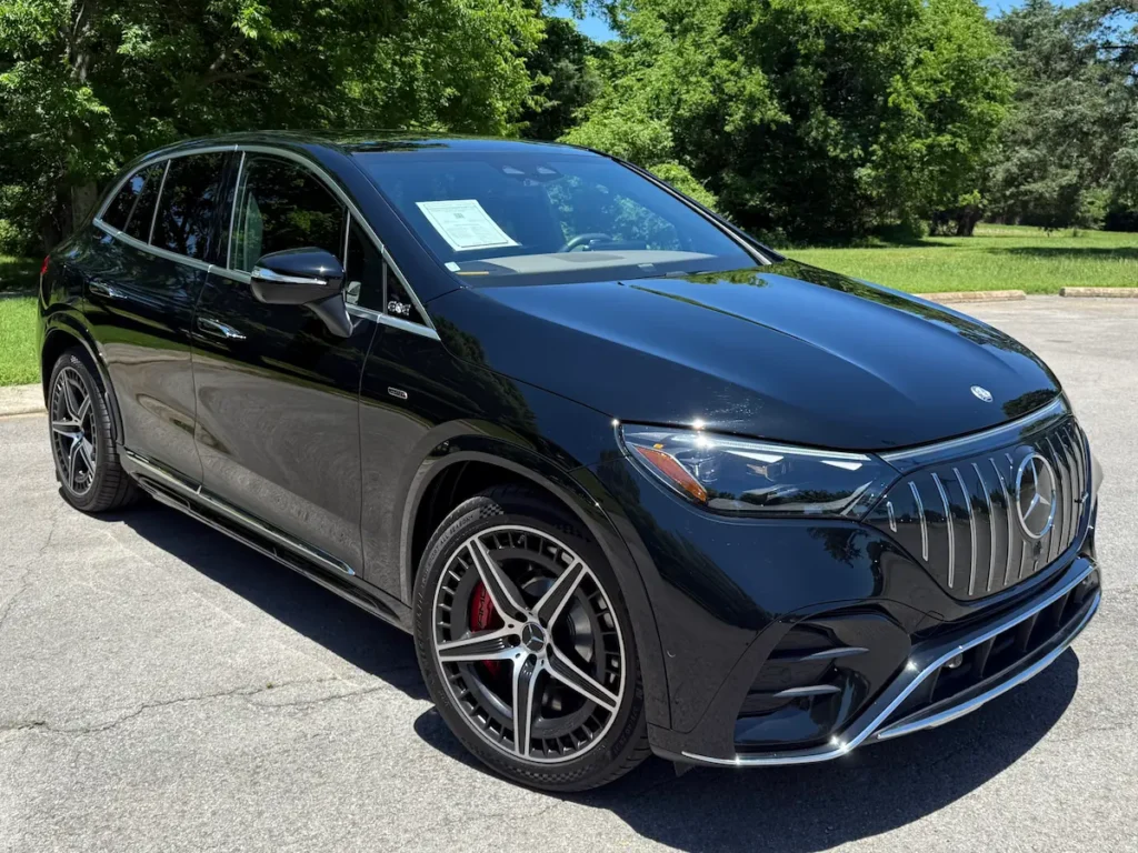 Black 2024 Mercedes-Benz EQE AMG electric SUV shown from the front exterior angle