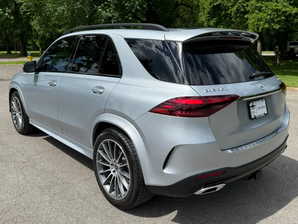 Rear view of 2024 Mercedes-Benz GLE 450 in silver with LED taillights and chrome accents.