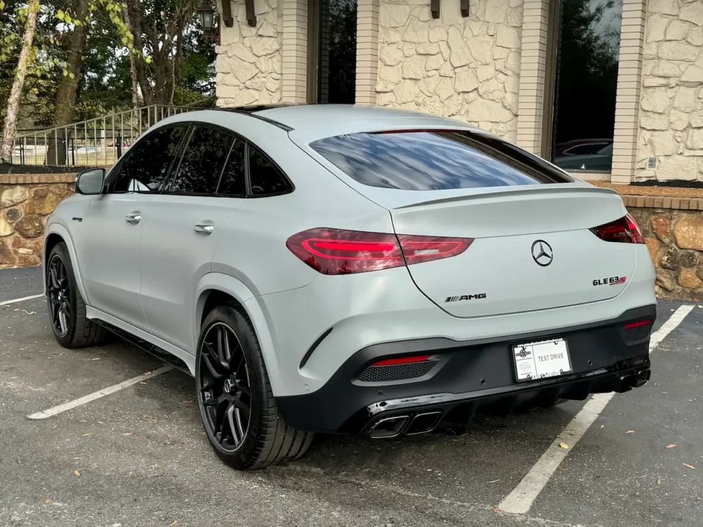 2024 Mercedes-Benz GLE 63 S AMG Coupe rear angle showing quad exhaust and LED taillights