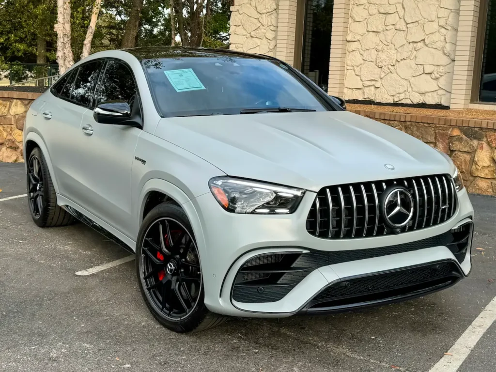 2024 Mercedes-Benz GLE 63 S AMG Coupe front view in matte gray with Panamericana grille.