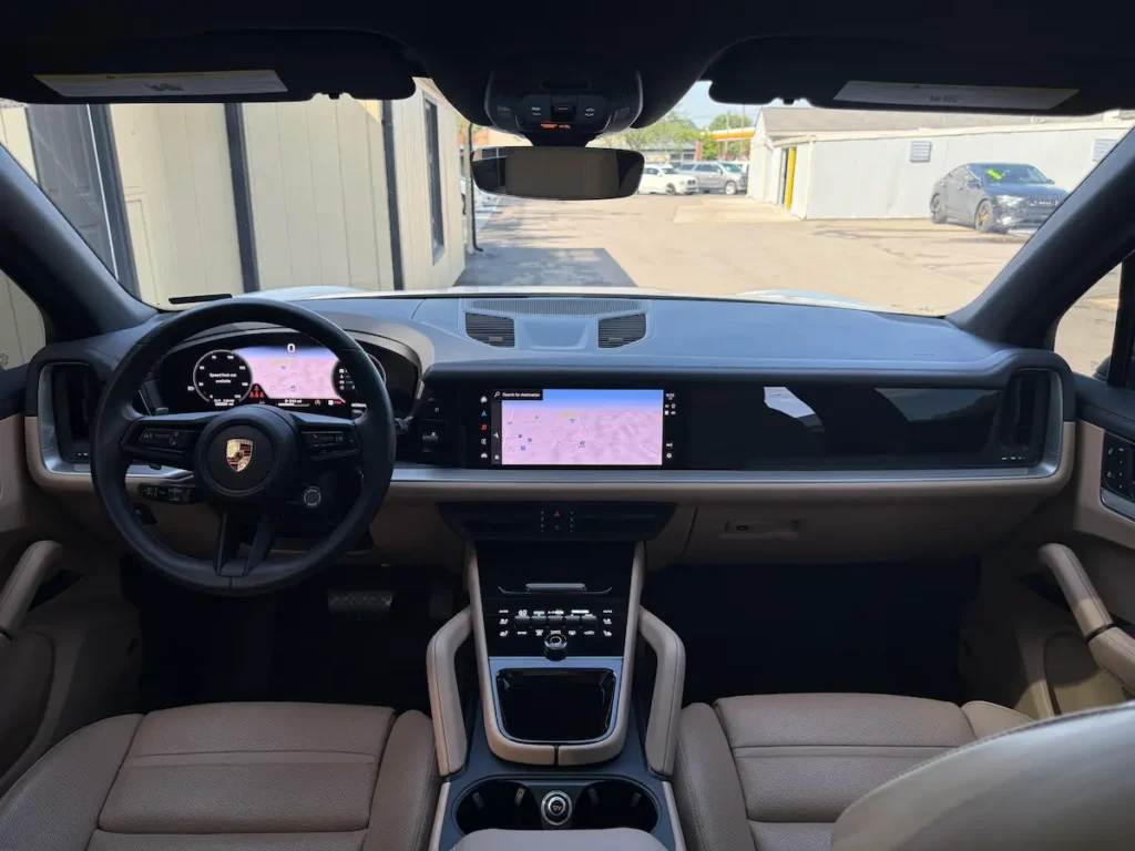 Porsche Cayenne interior dashboard with digital display and luxury design
