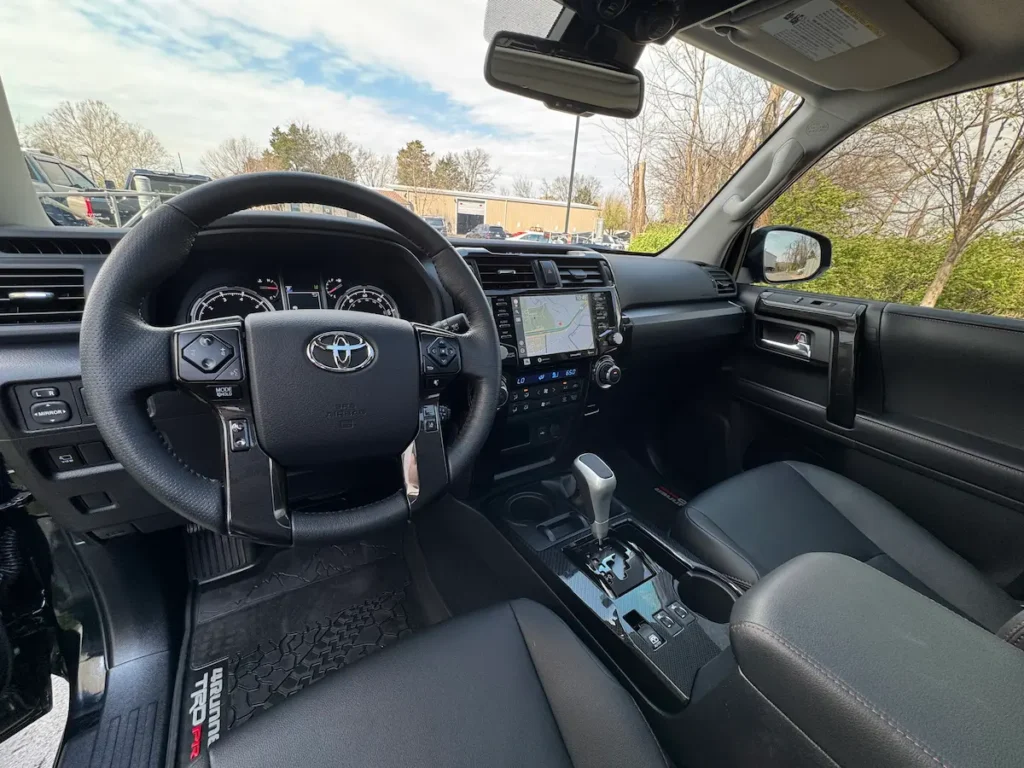 2024 Toyota 4Runner black interior dashboard steering wheel view