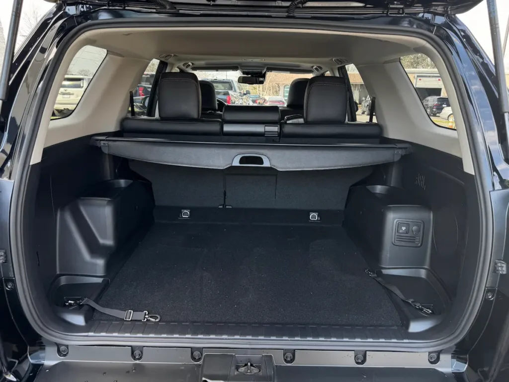 Cargo area of a 2024 Toyota 4Runner with the second-row seats upright.