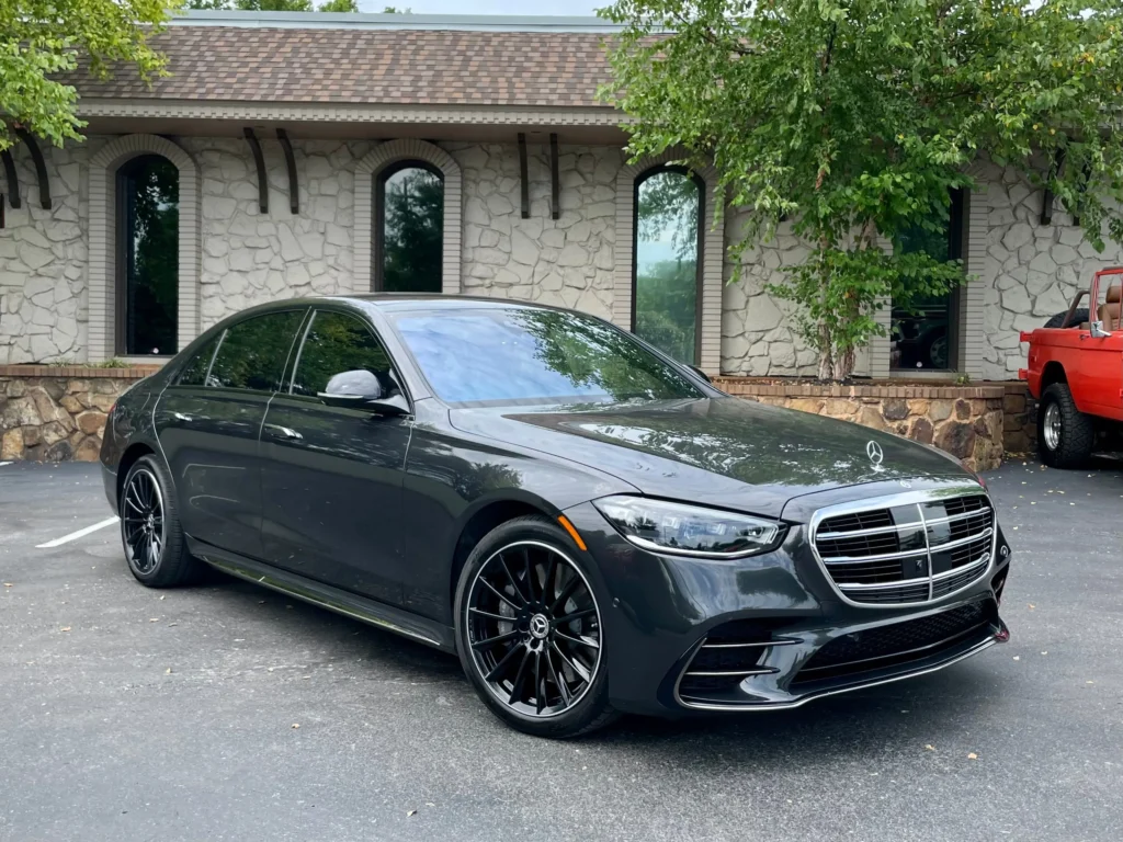 2024 Mercedes-Benz S580e in gray with AMG Line and plug-in hybrid features, parked at AutoPro Nashville.