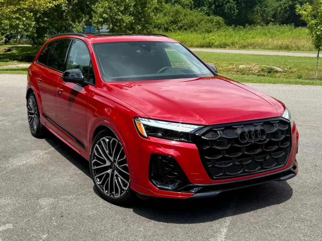 Red Audi SQ7 front view with aggressive grille and luxury SUV styling