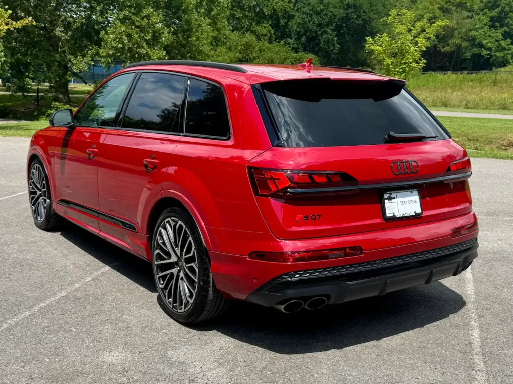 Red Audi SQ7 rear view with sporty design and quad exhaust