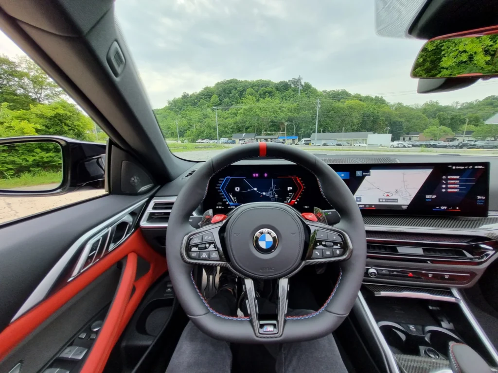 Interior of 2025 BMW M4 Competition with premium leather seating at AutoPro Nashville
