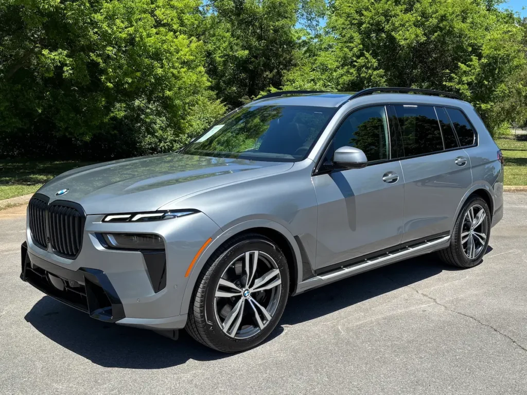 2025 BMW X7 front view gray luxury SUV with large kidney grille