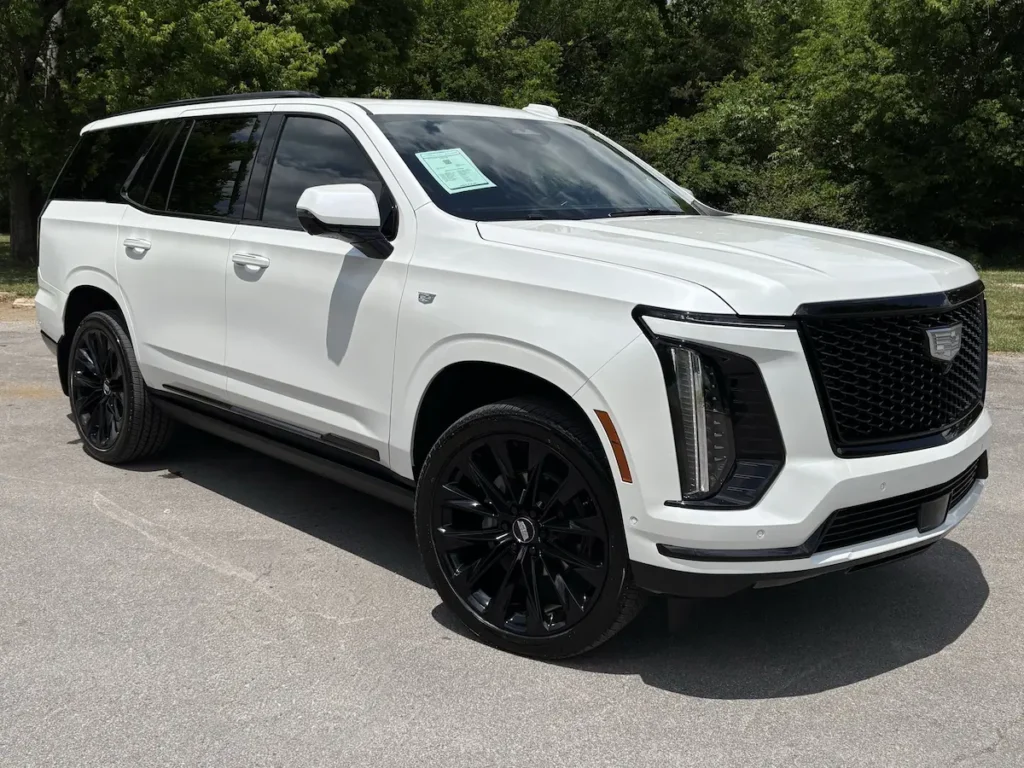 White 2025 Cadillac Escalade luxury SUV shown from the front exterior angle