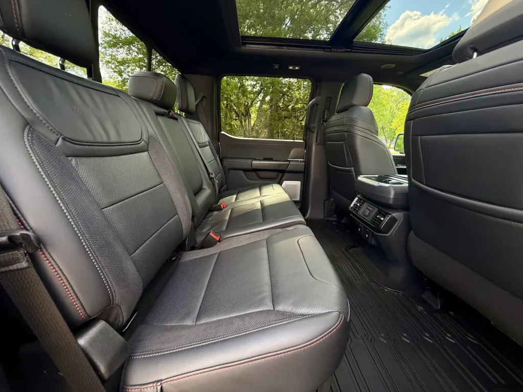 Rear-seat interior of a gray 2025 Ford F-150 Raptor crew cab