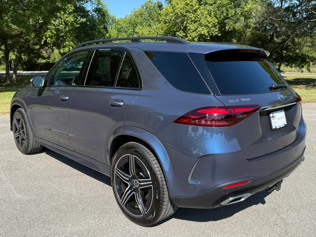 Rear view of 2025 Mercedes-Benz GLE 350 in blue with LED taillights and chrome accents.