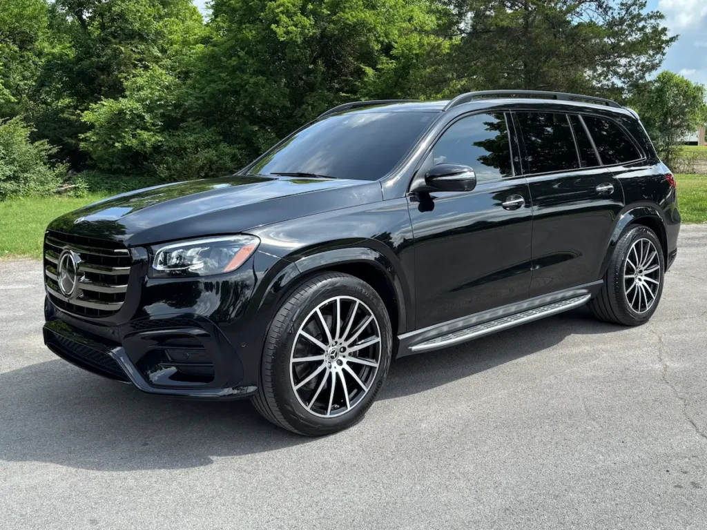 Front three-quarter view of a black 2025 Mercedes-Benz GLS 450 4MATIC luxury SUV