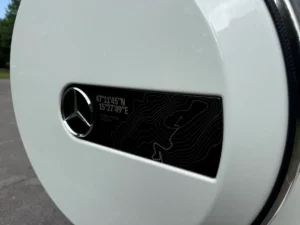 2025 Mercedes-Benz G550 rear spare tire cover with topographic coordinate design