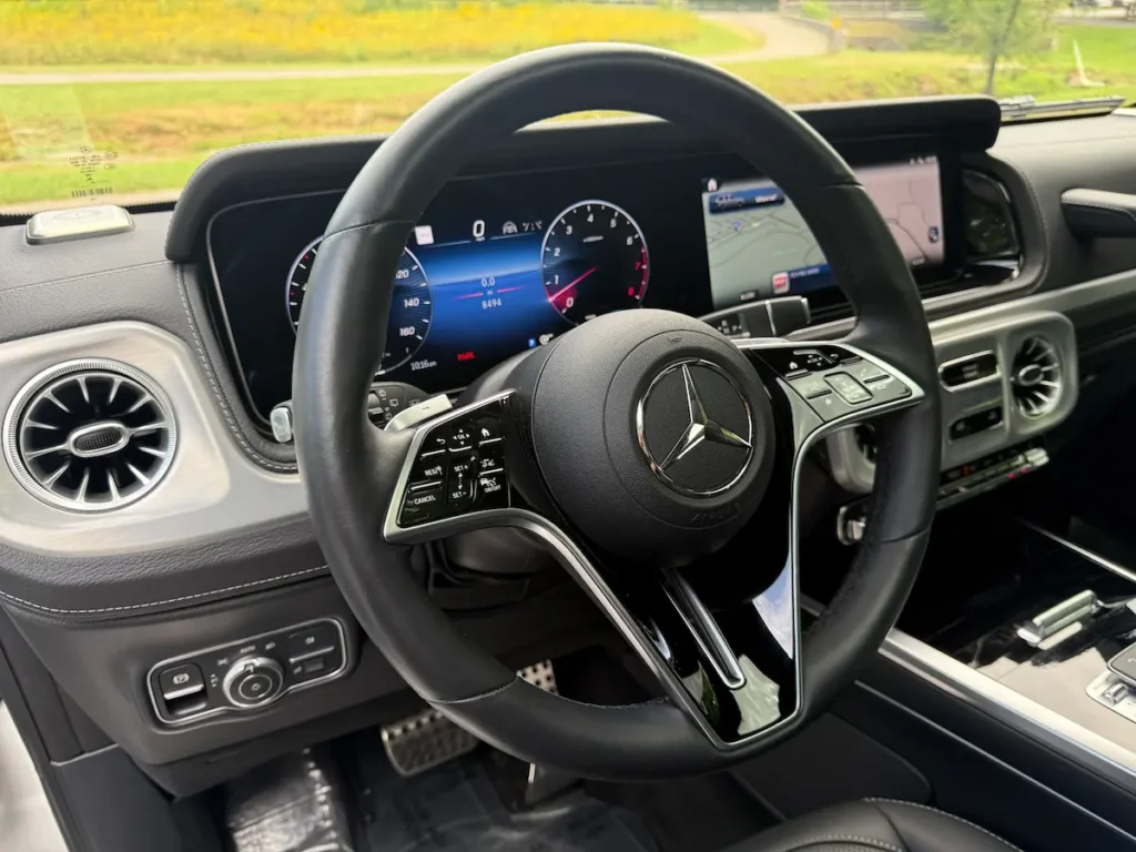 2025 Mercedes-Benz G550 steering wheel with multifunction controls and digital display