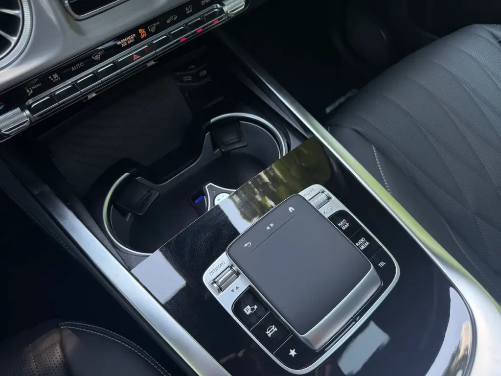 2025 Mercedes-Benz G63 AMG center console with touchpad controller and dynamic drive mode selector