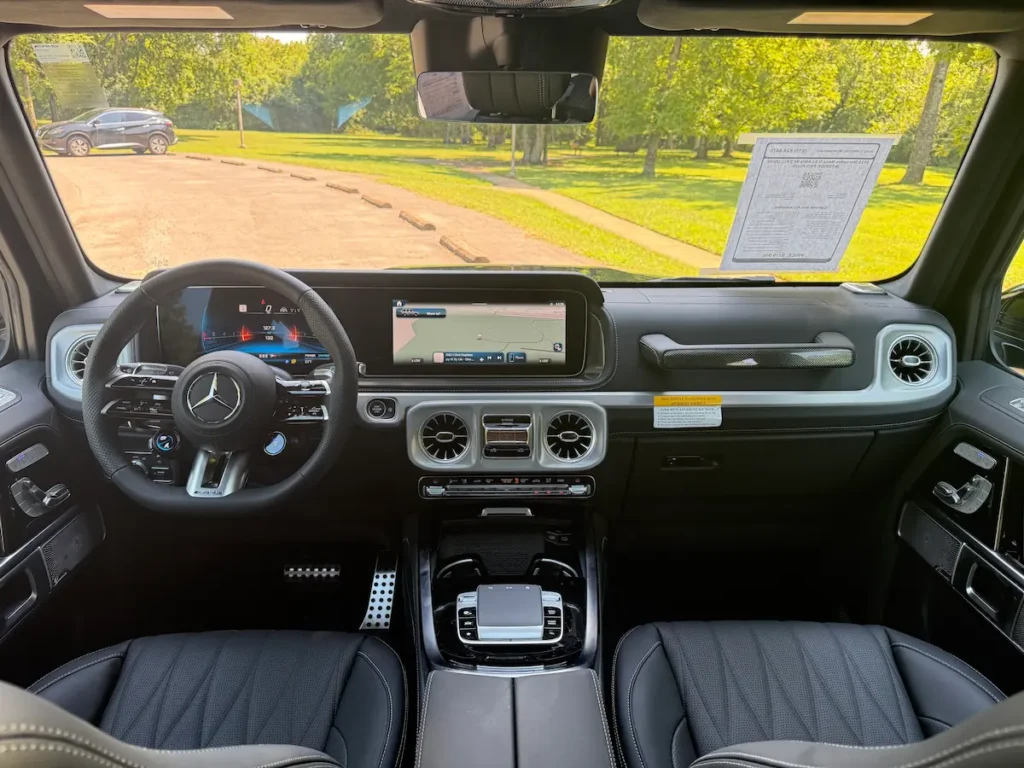 2025 Mercedes-Benz G63 AMG interior dashboard with widescreen digital display and MBUX system