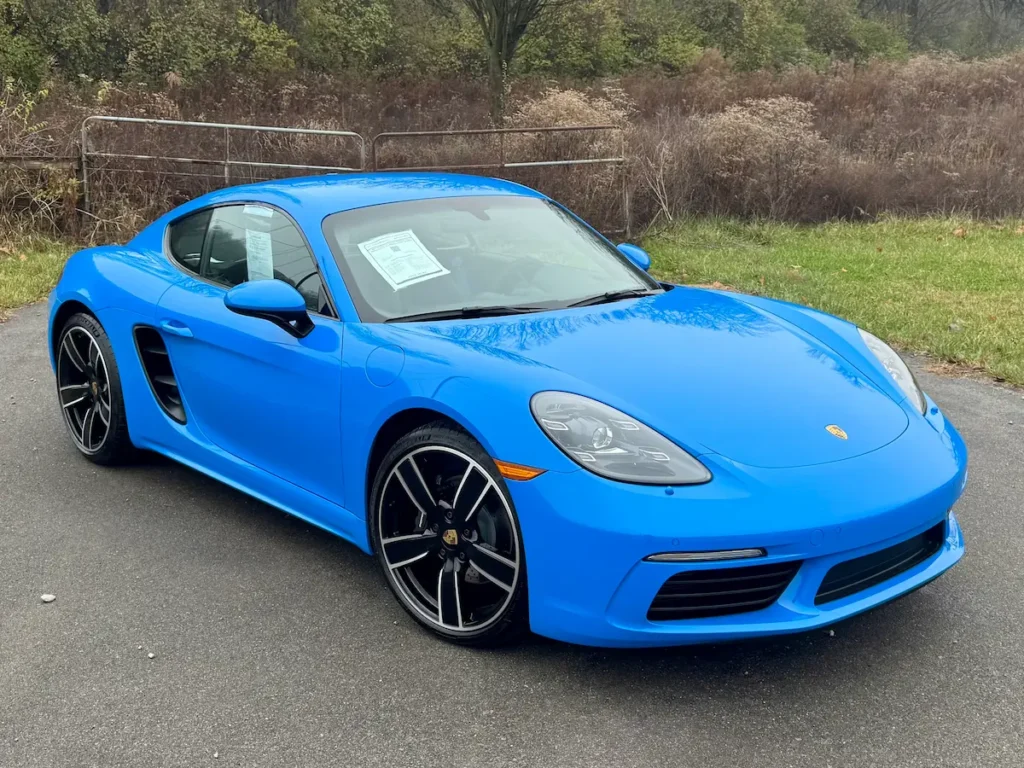 2025 Porsche 718 Cayman blue front exterior, used sports car example
