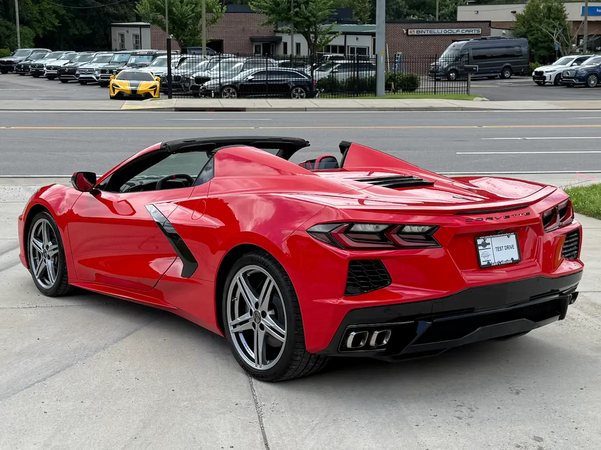 Rear three-quarter view of a red 2026 Chevrolet Corvette Stingray 1LT convertible