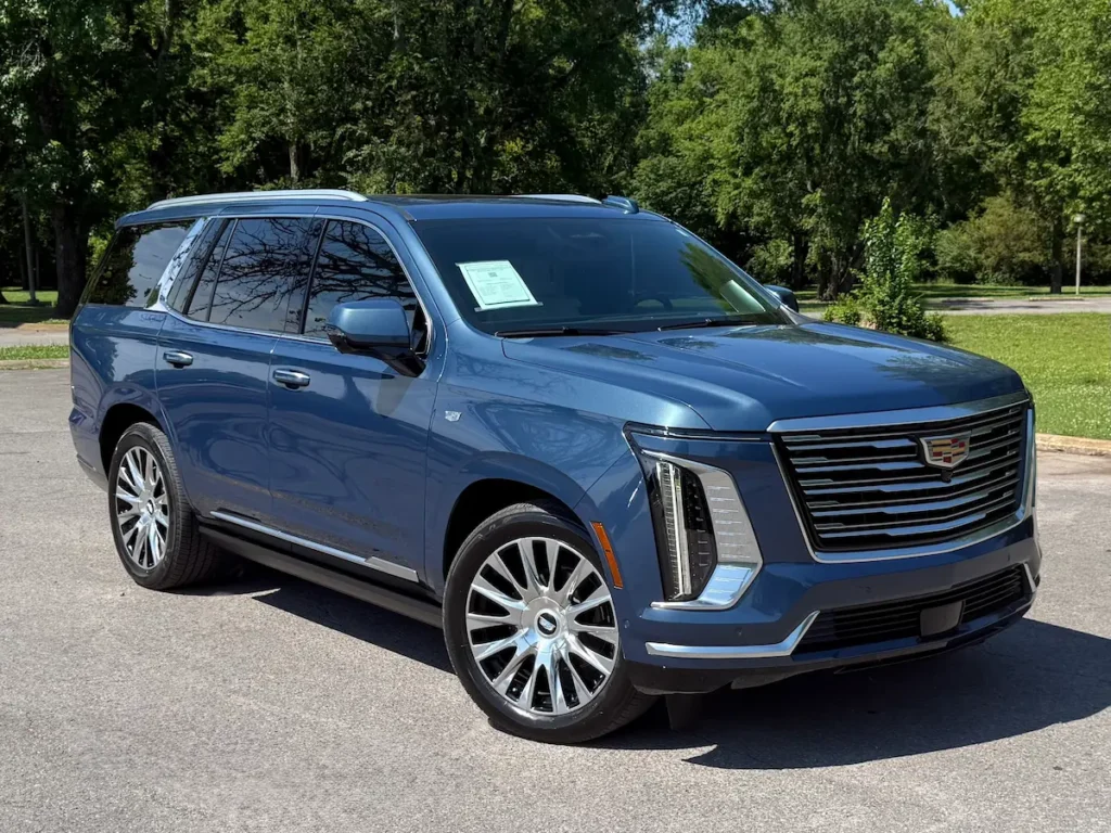 Front three-quarter view of a blue 2026 Cadillac Escalade luxury SUV