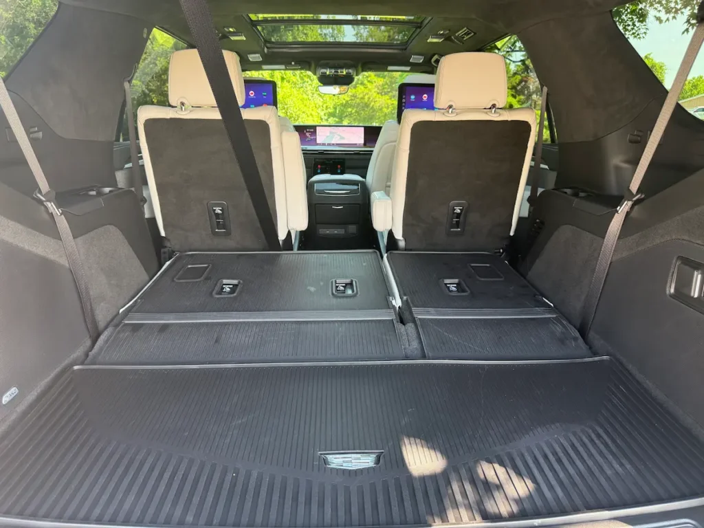 Cargo area of a blue 2026 Cadillac Escalade with the third-row seats folded