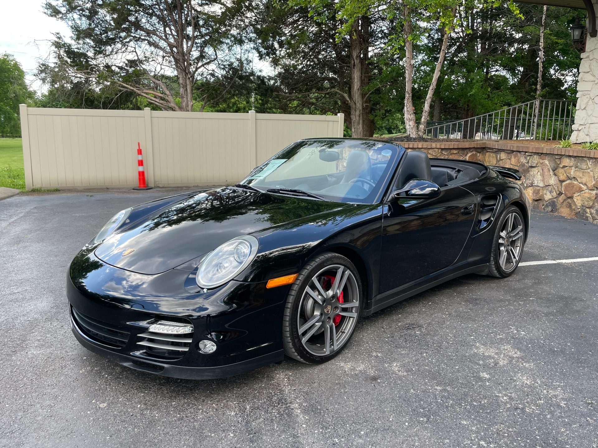 Front view of a used 2010 Porsche 911 Cabriolet Turbo at AutoPro Nashville.