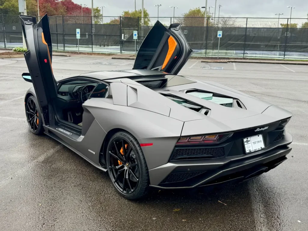 Lamborghini Aventador LP 740-4 S rear angle with open scissor doors.