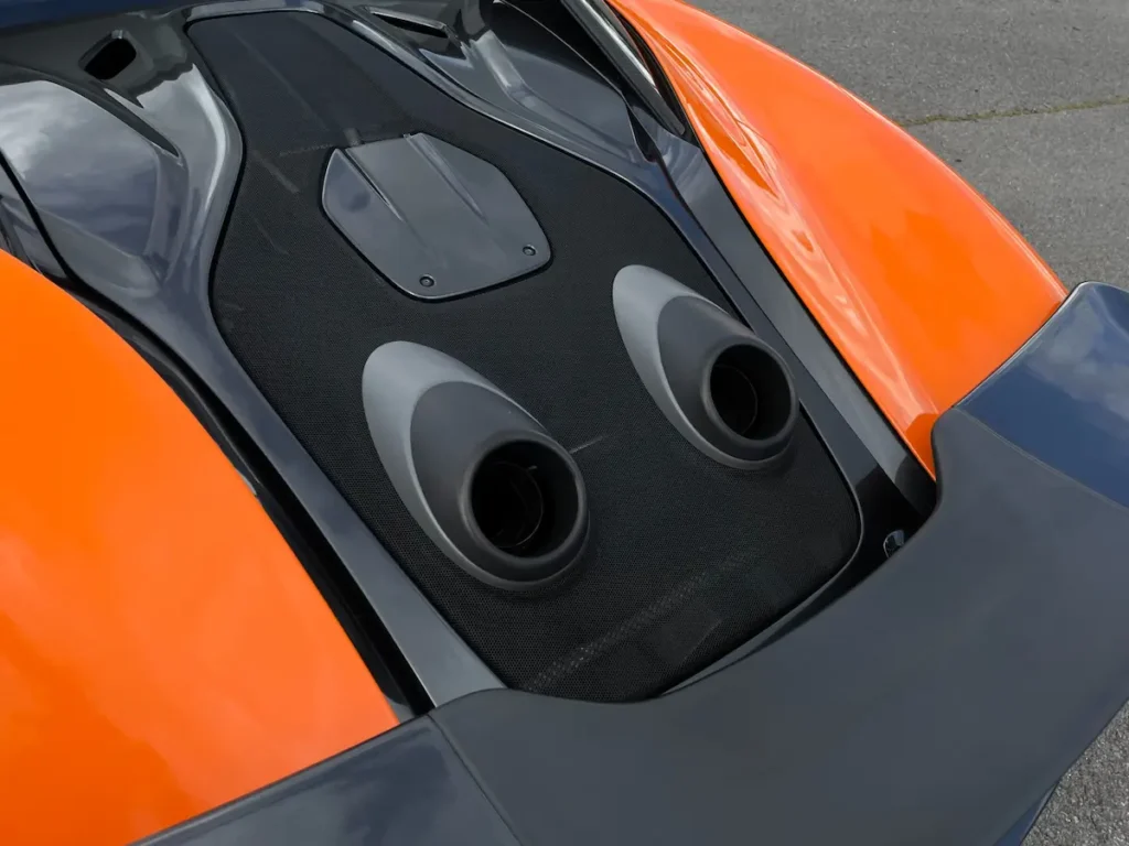 Close-up of McLaren 600LT top-mounted titanium exhaust pipes.