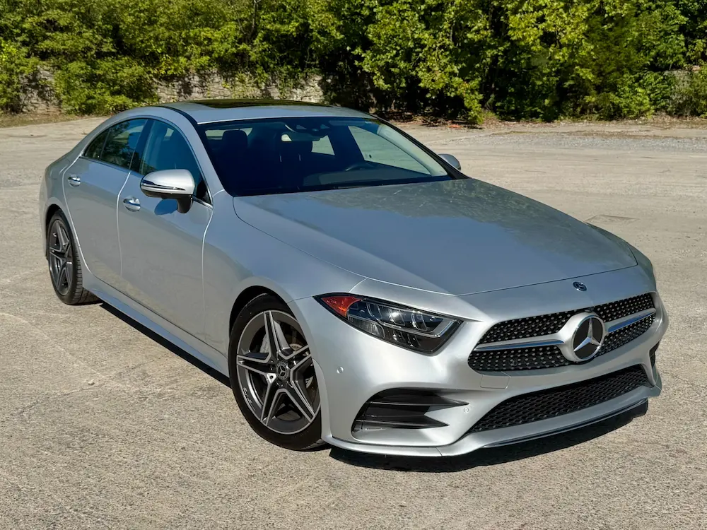 2019 Mercedes-Benz CLS 450 in silver highlighting coupe-inspired four-door design.