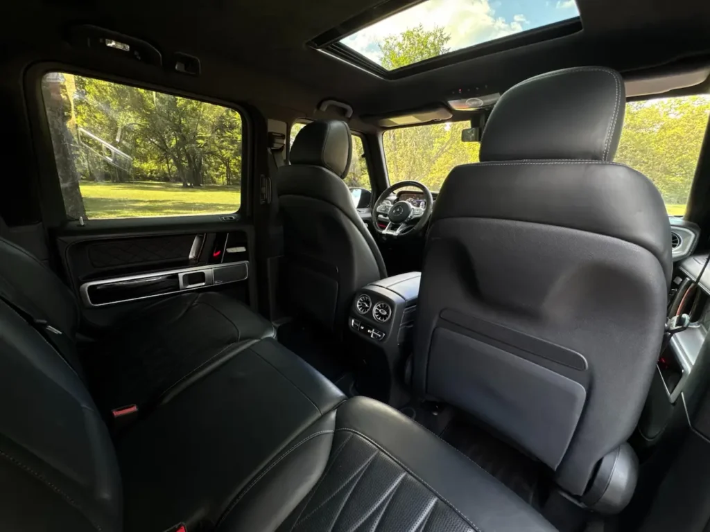 Rear seat view of Mercedes-Benz G63 AMG showing premium black leather interior