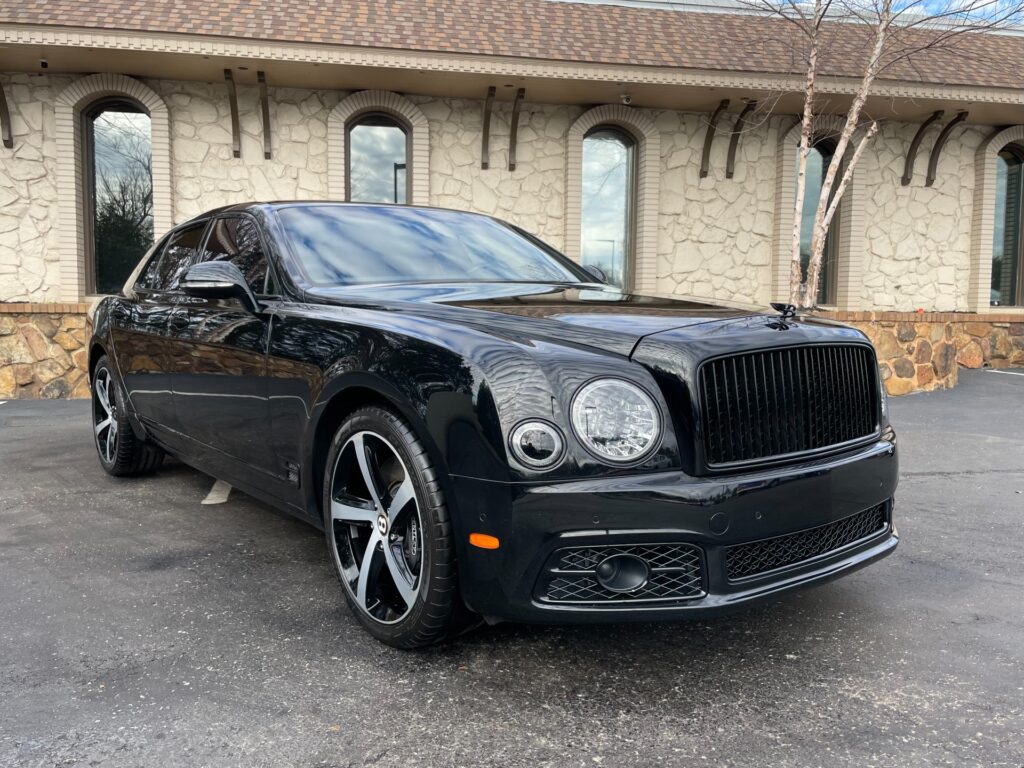 A black 2020 Bentley Mulsanne Speed parked in the AutoPro Nashville parking lot.