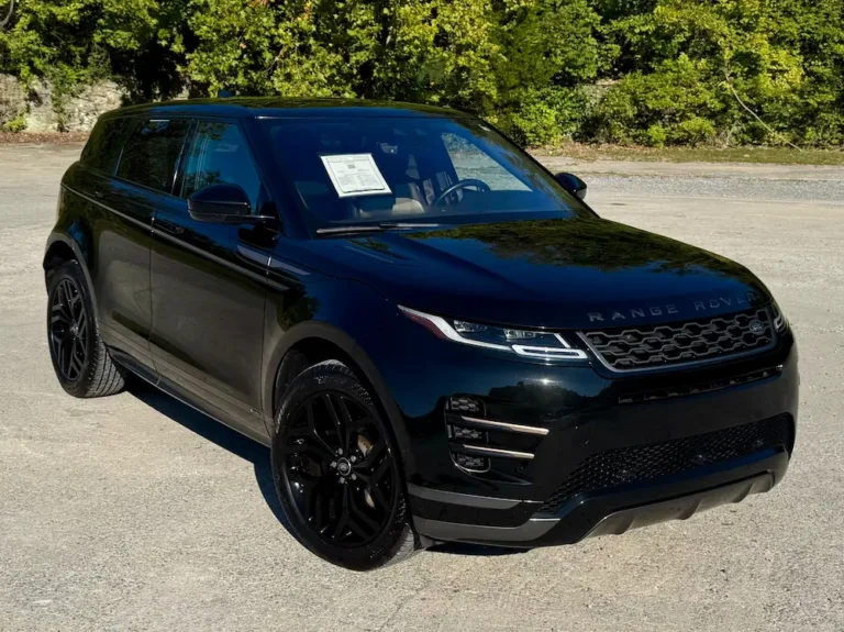 Used Range Rover Evoque black SUV with slim headlights and sporty stance