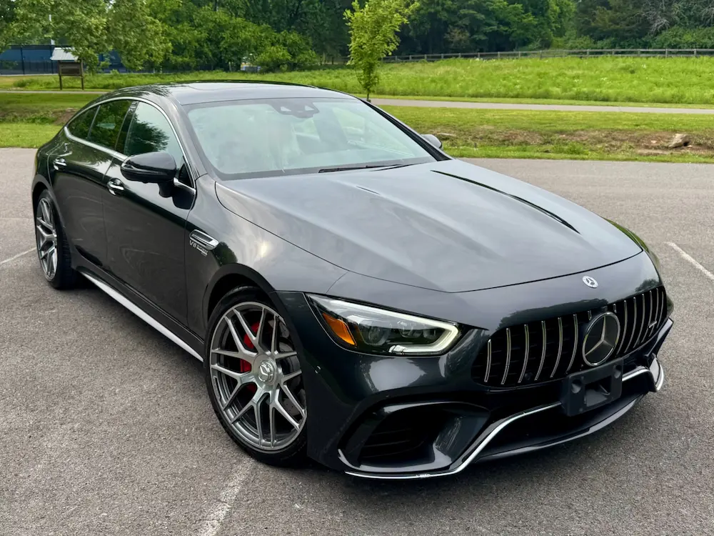 2021 Mercedes-AMG GT 63 S 4MATIC+ in black highlighting front fascia and AMG wheels.