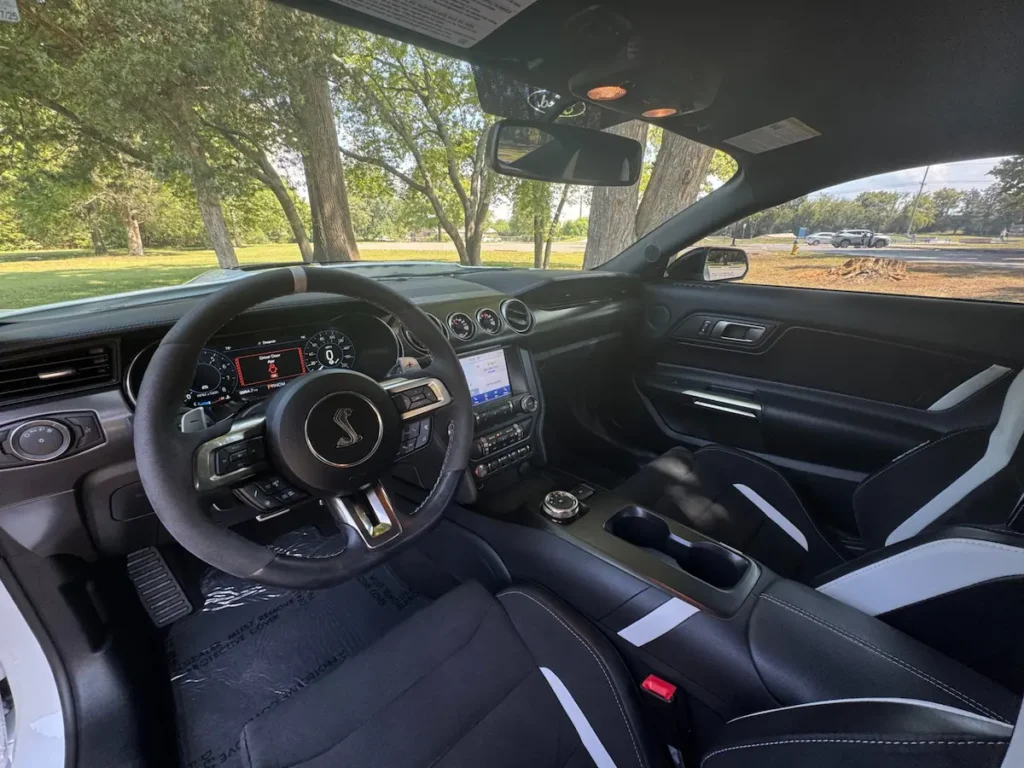 Interior of 2021 Shelby GT500 with Recaro seats and flat-bottom steering wheel