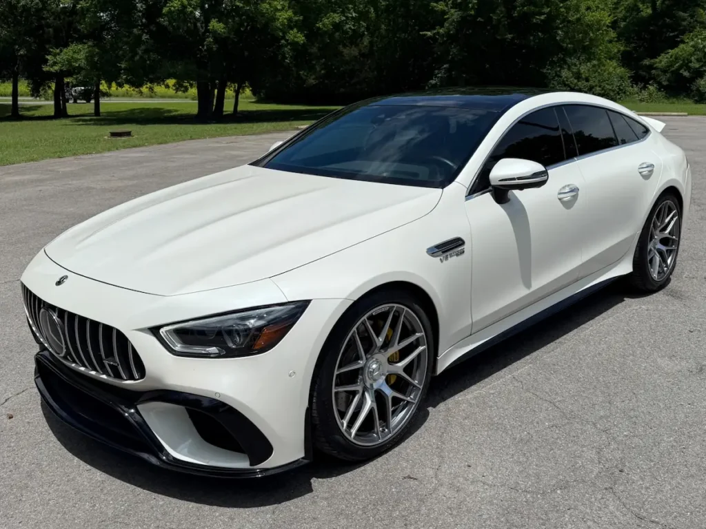 Mercedes-AMG GT 63 S 4-Door Coupe front view in white with black accents