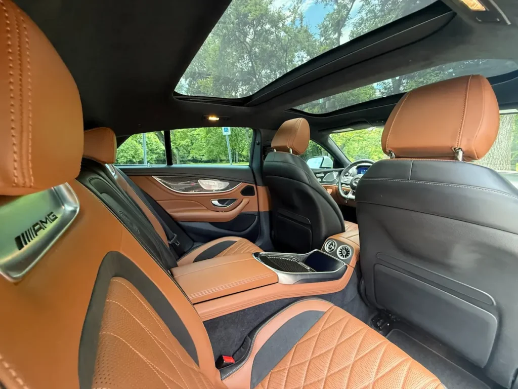 Mercedes-AMG GT 63 S 4-Door Coupe rear cabin with brown leather and panoramic roof