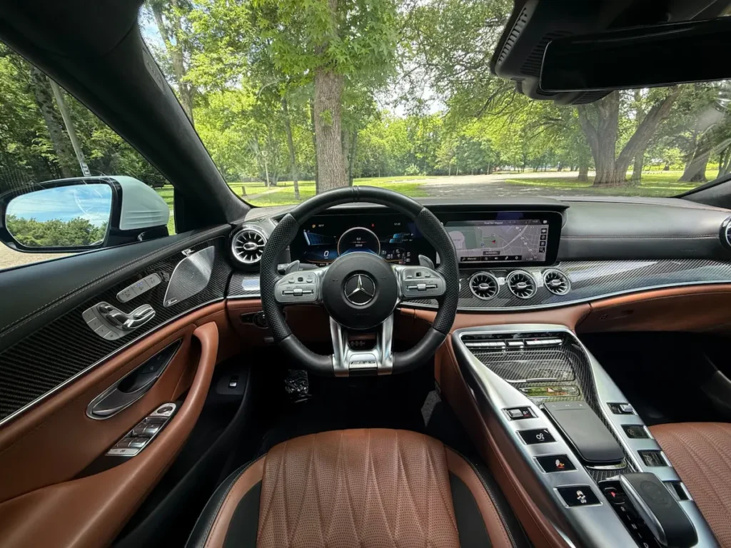 Mercedes-AMG GT 63 S cockpit with MBUX display and carbon-fiber center console
