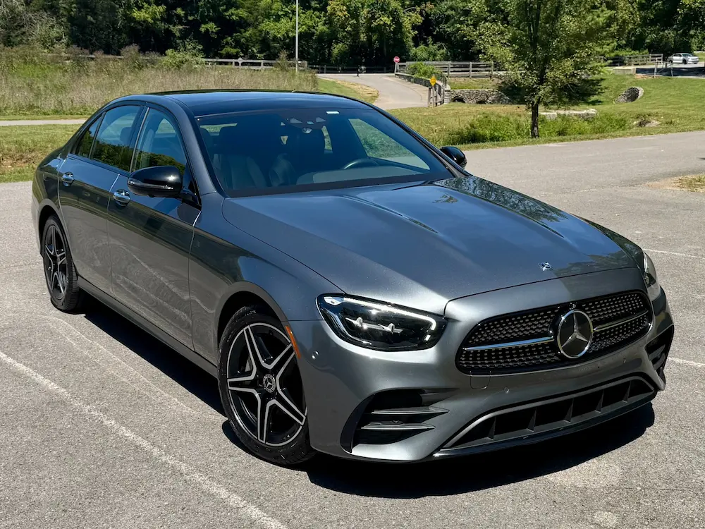 2021 Mercedes-Benz E 350 4MATIC in graphite gray showing AMG Line exterior styling.