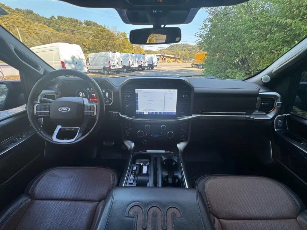 Front cabin of a 2022 Ford F-150 King Ranch with digital display and SYNC 4 infotainment system.