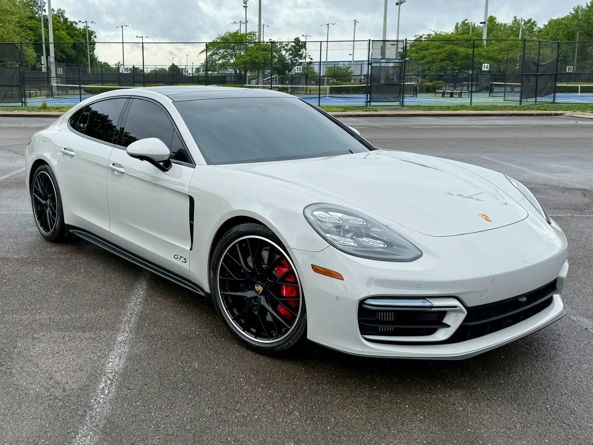 White 2022 Porsche Panamera GTS shown from the front three-quarter angle.