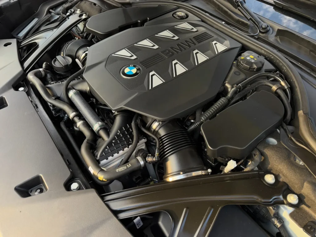 Engine bay of the used 2023 BMW 760i xDrive, showcasing its powerful V8 engine.