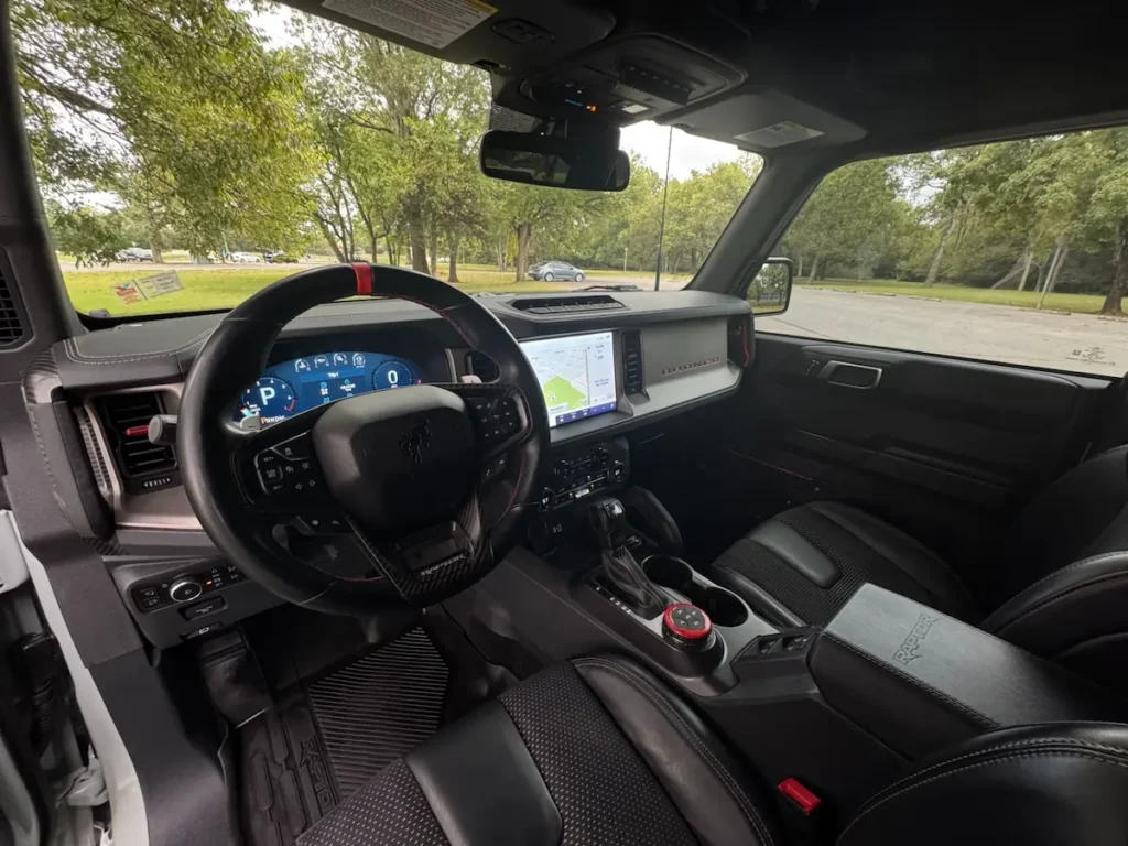 2023 Ford Bronco Raptor interior with digital dash and off-road controls
