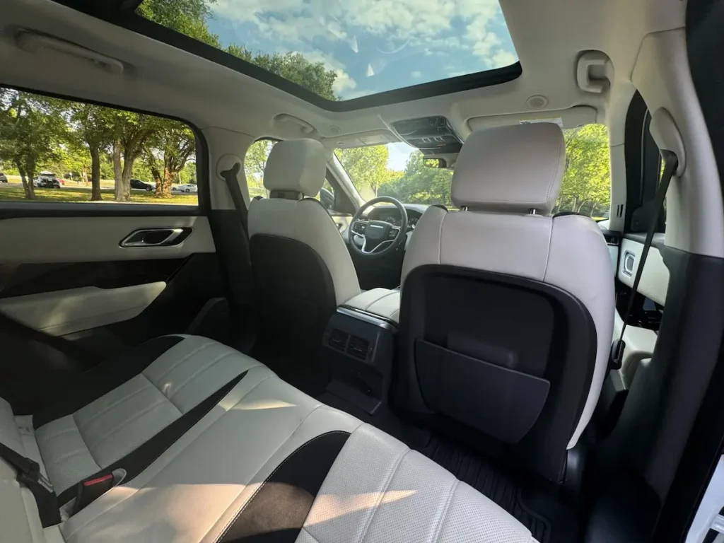 Rear seats and panoramic roof inside a 2023 Range Rover Velar P340 R-Dynamic S.