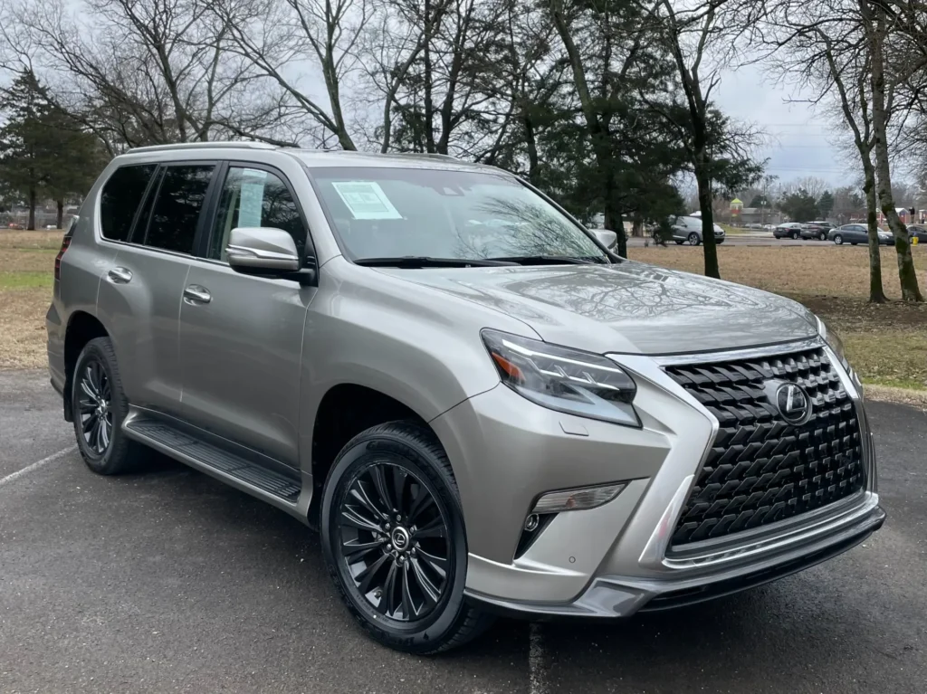 2023 Lexus GX 460 Luxury Sport Design Package in metallic silver, parked outdoors.