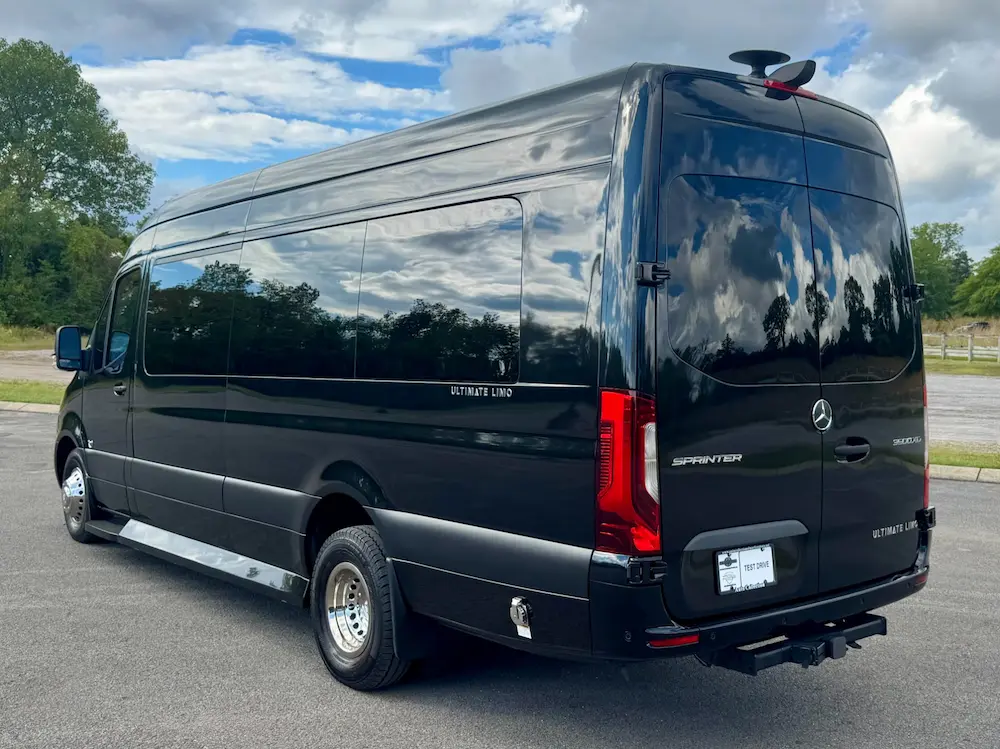 Rear view of 2023 Mercedes-Benz Sprinter 3500XD 170 EXT Ultimate Limo showing Ultimate Limo badging and tinted windows.