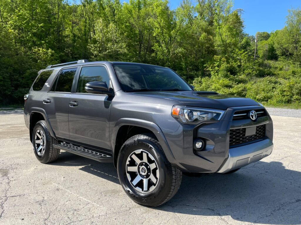 A sleek, 2023 Toyota 4Runner TRD Off-Road Premium SUV in [color of the car] parked on a sunny used car dealership lot.