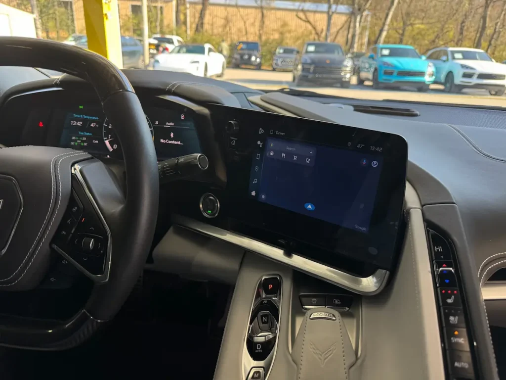 Corvette Z06 digital gauge cluster and center infotainment display from driver’s seat