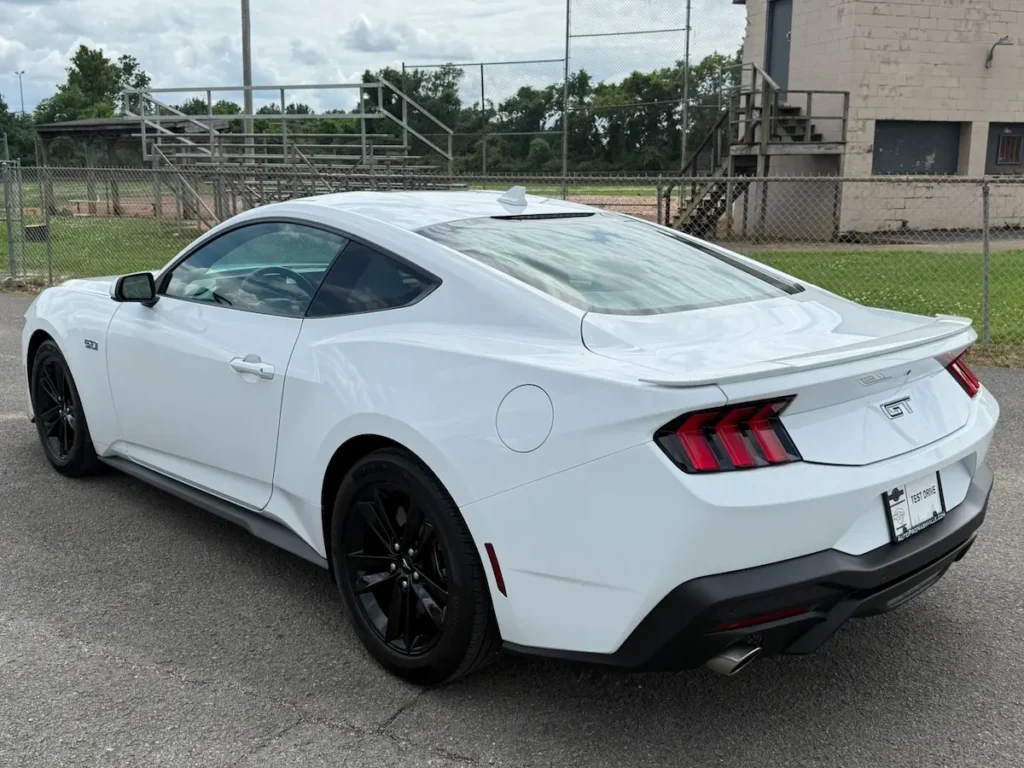 Rear view of used 2024 Ford Mustang GT white coupe