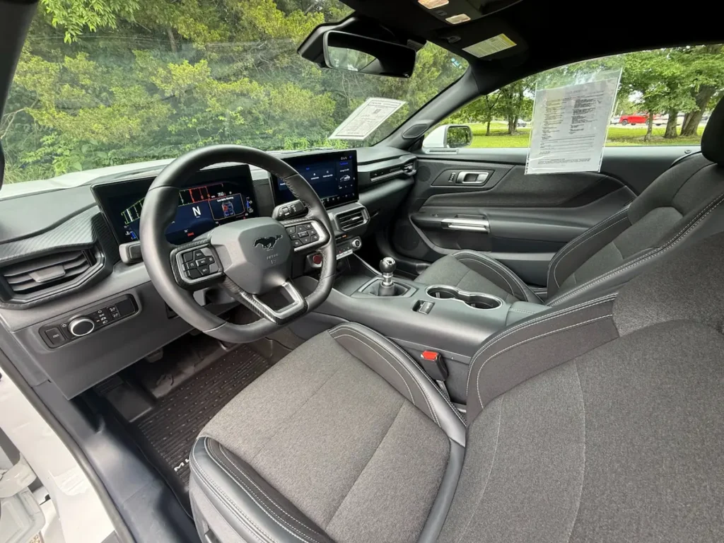 Interior of 2024 Ford Mustang GT showing cockpit and digital displays